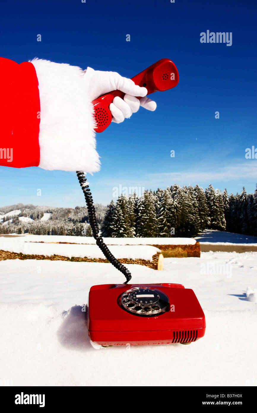 Santa Claus Hotline symbolized by a red retro phone Stock Photo Alamy