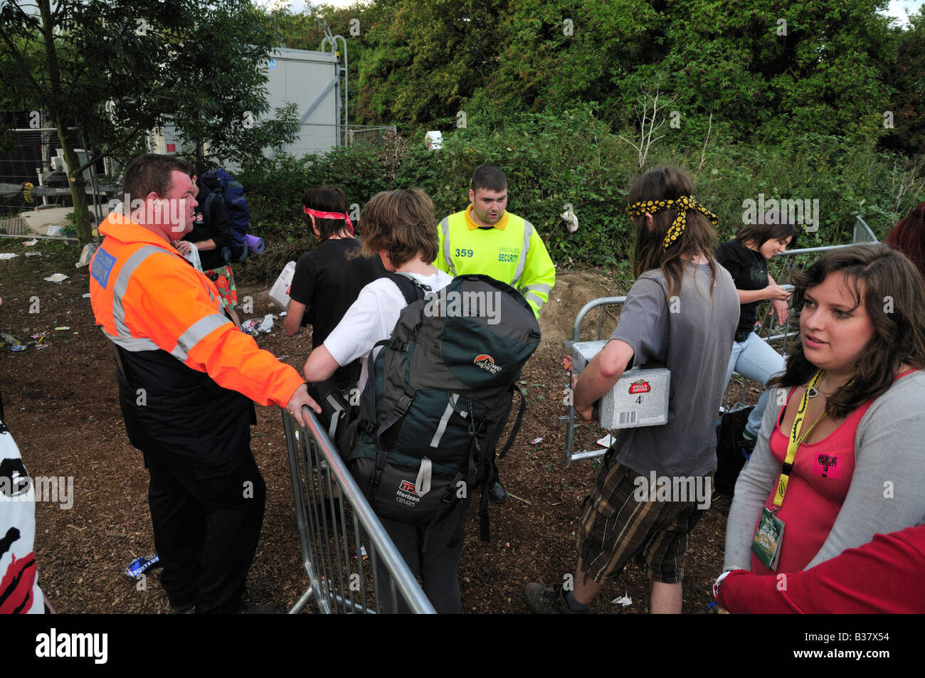 Main entrance to Reading Festival camp site showing security guards