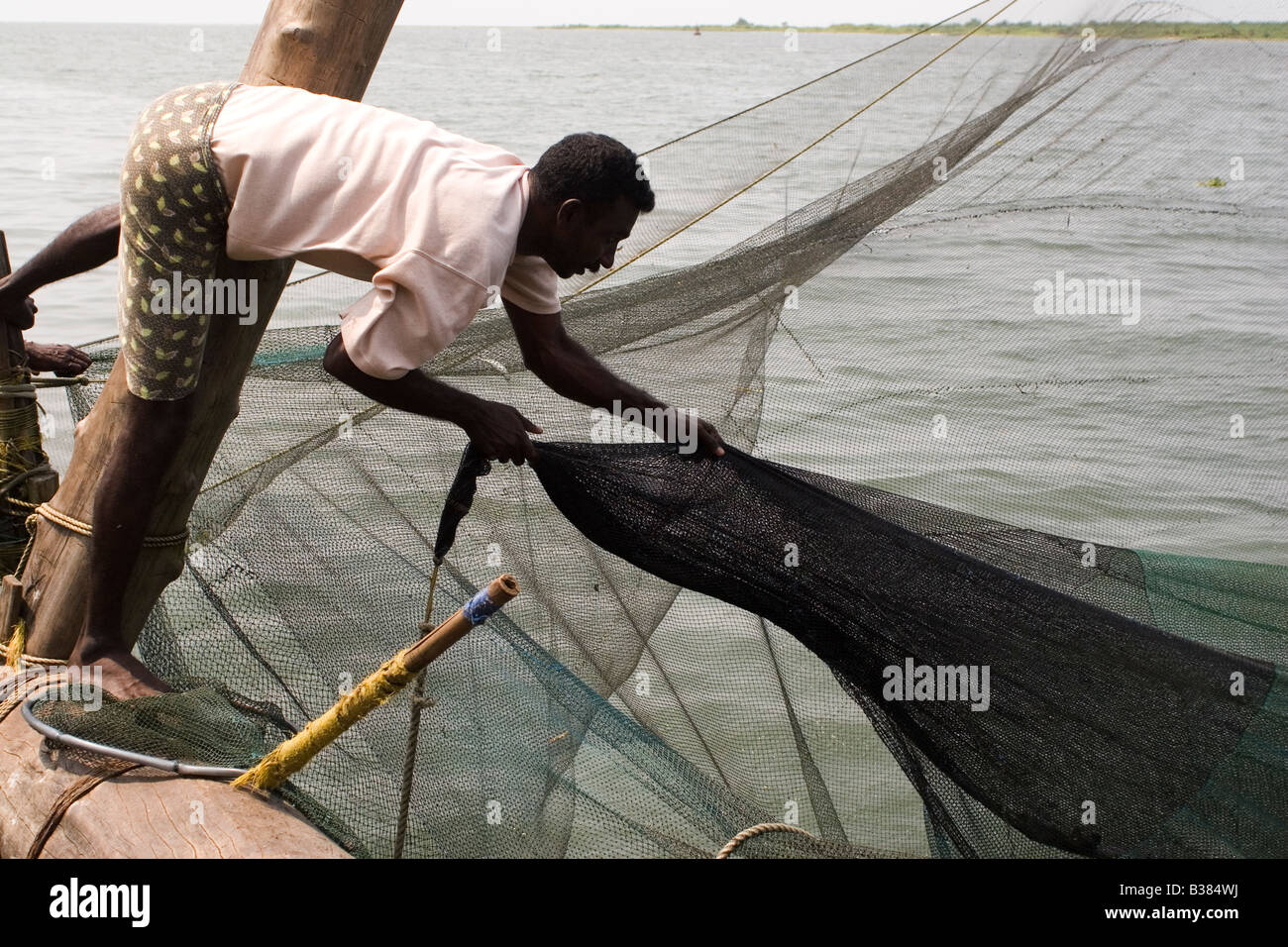 Man fishing nets muscat oman hi-res stock photography and images - Alamy