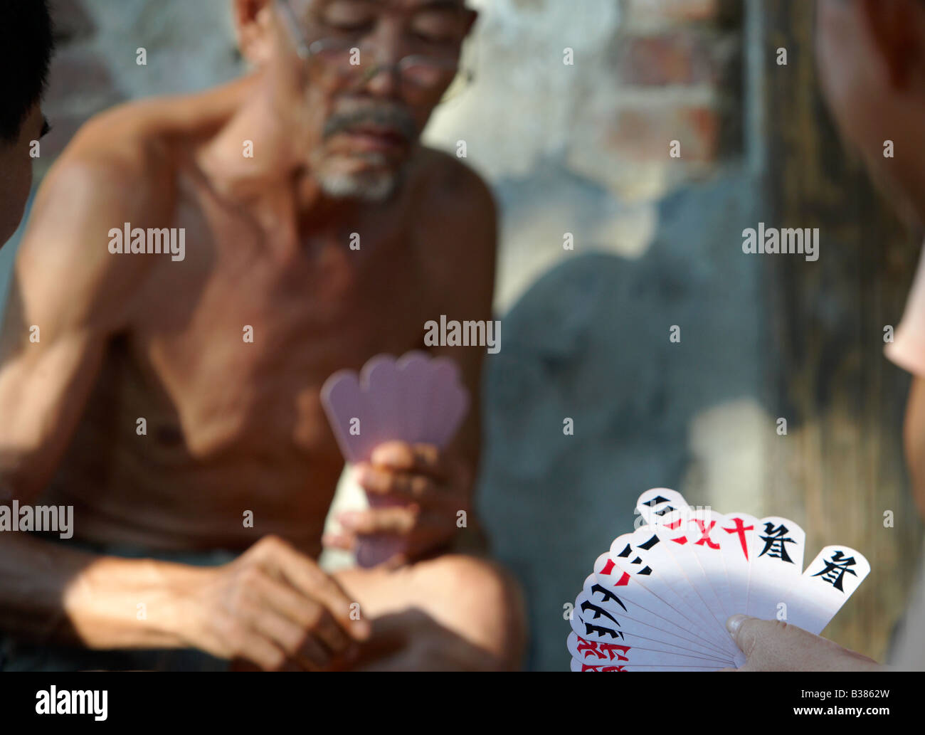 Zi pai Chinese poker The people and sights of Guilin Southern China Stock Photo