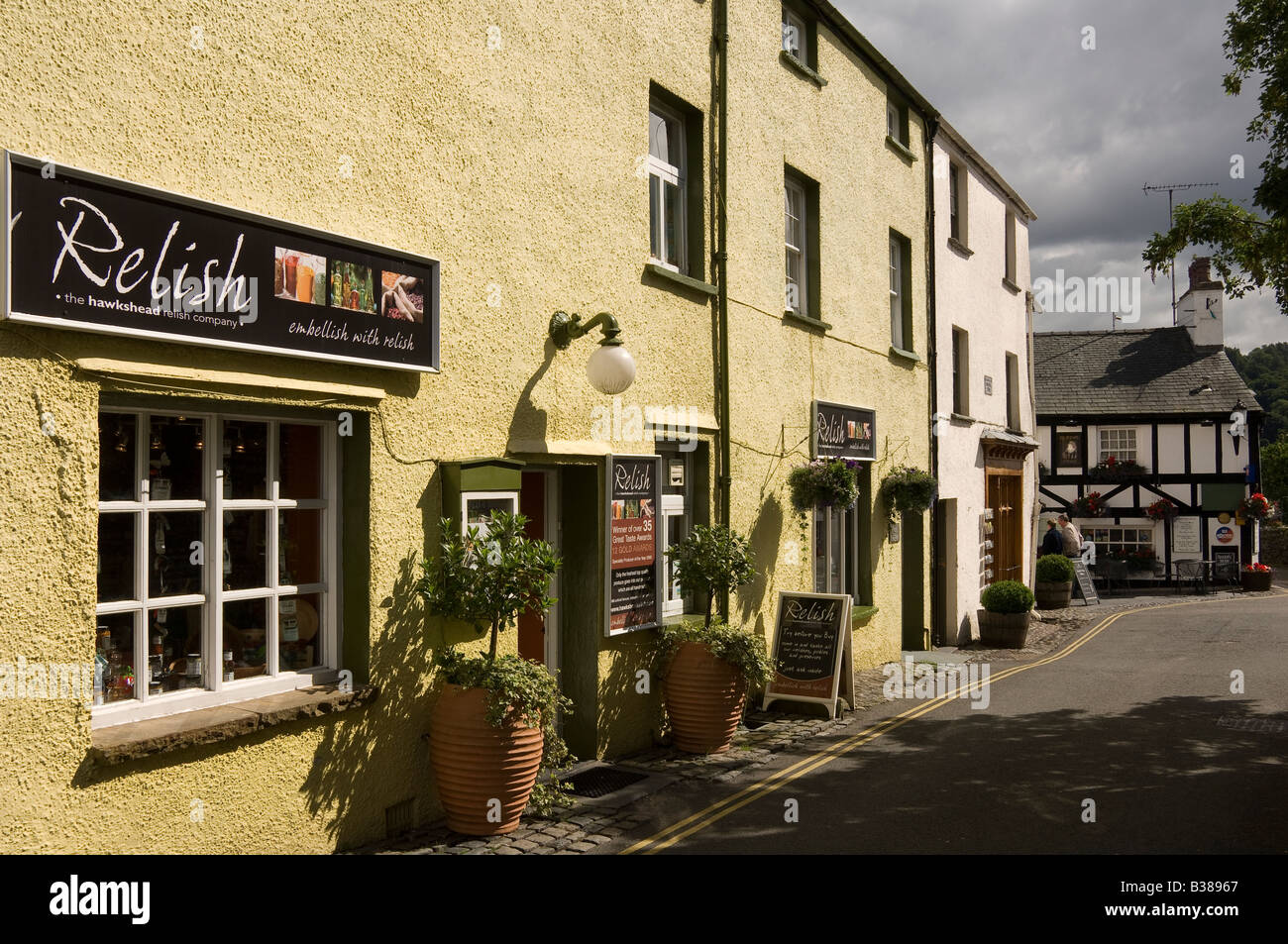 Village shops stores in summer Hawkshead Cumbria England UK United Kingdom GB Great Britain