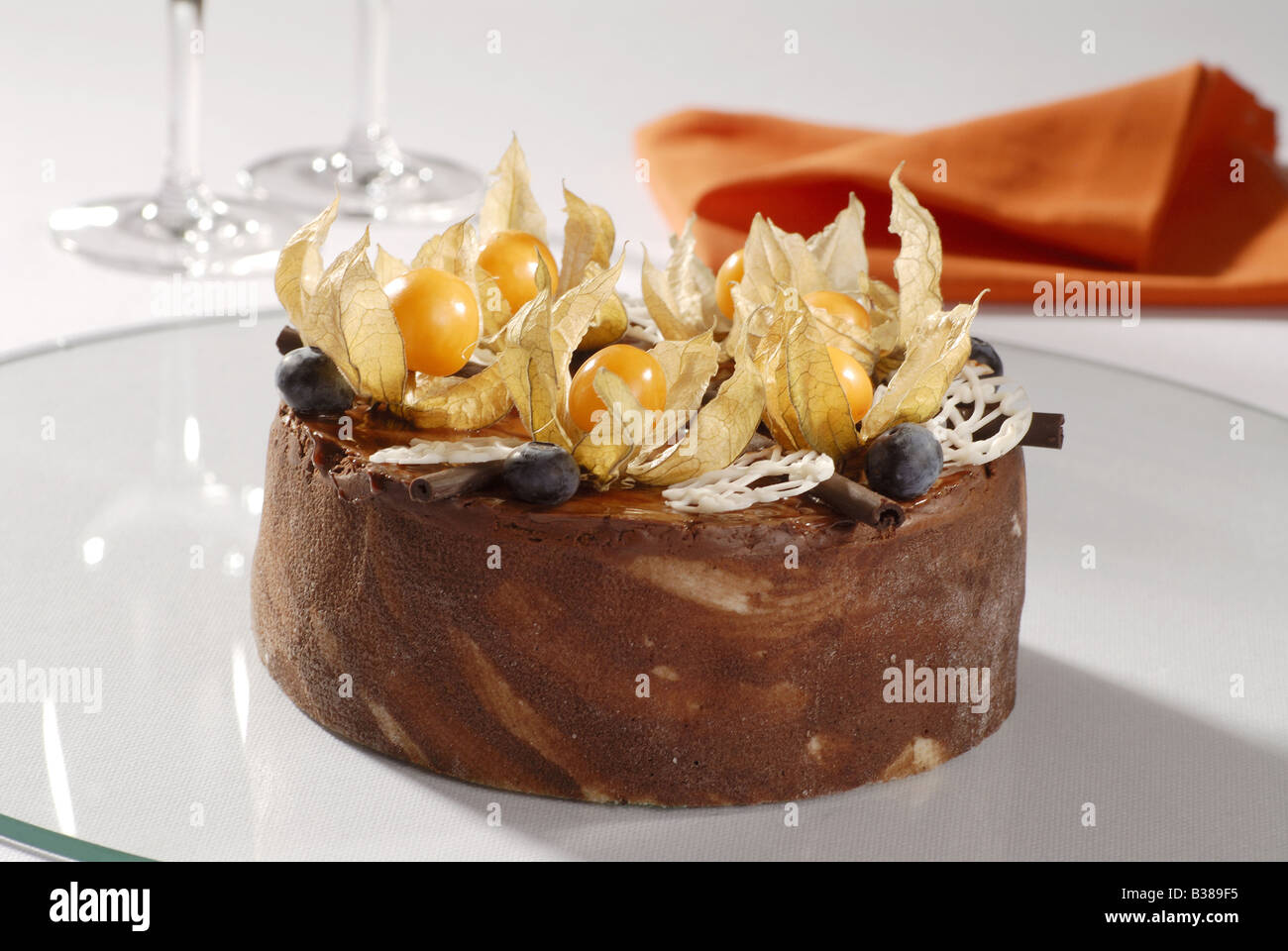 Chocolate Cream Cake Topped with Physalis Stock Photo