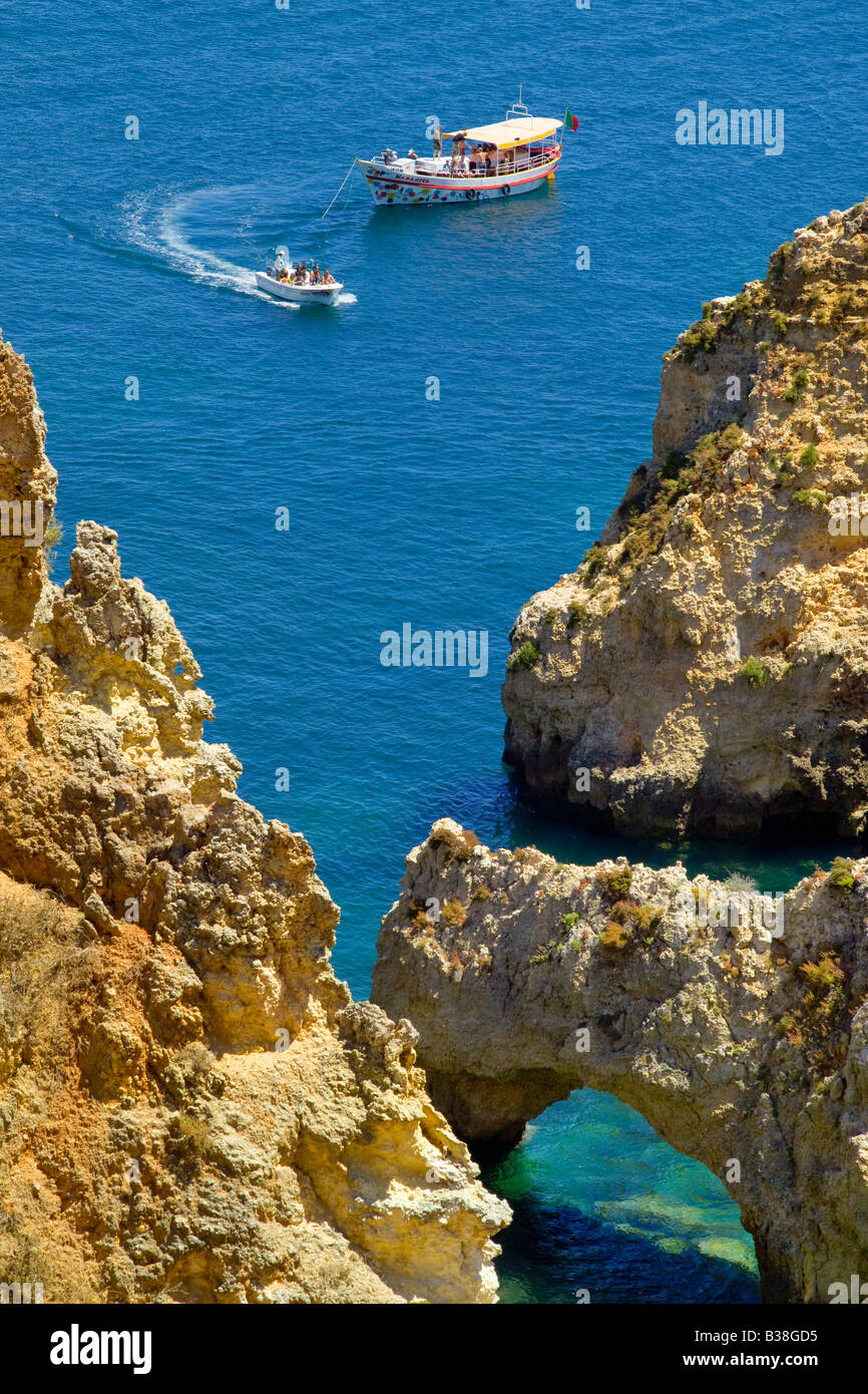 Portugal the Algarve near Lagos, Ponta da Piedade, tourist boats visiting the grottos Stock Photo