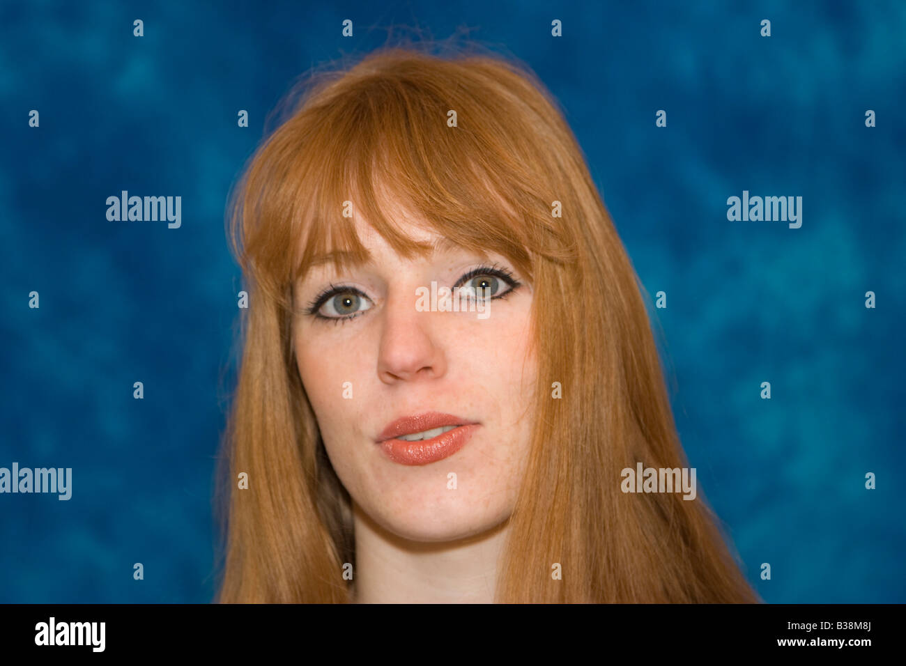portrait of a young woman with red hair Stock Photo - Alamy