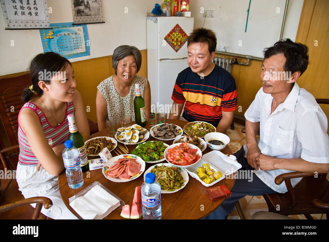 Modern Chinese peasant family eating meal Datianzhuang village, Juyang