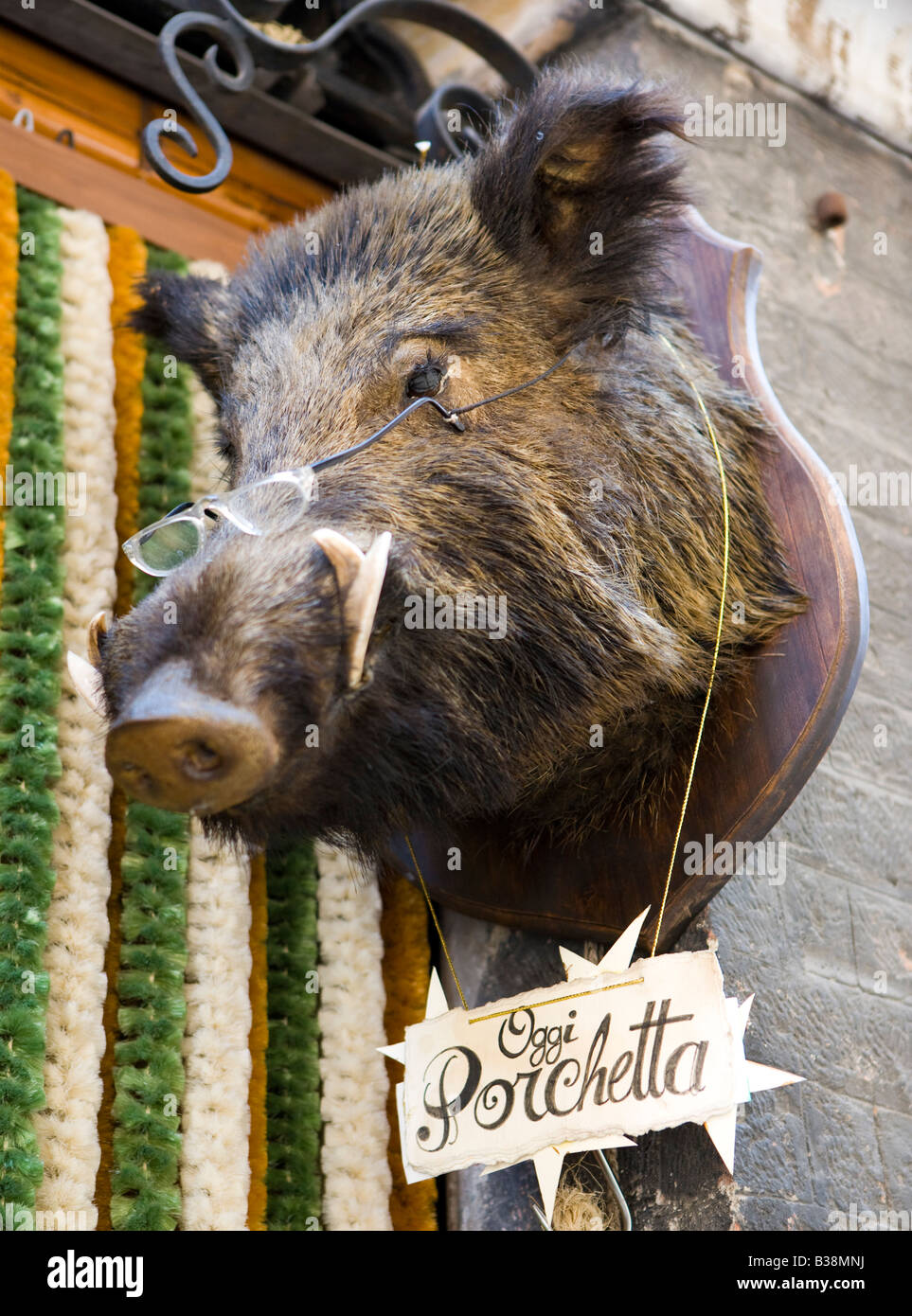 Boar s head wearing glasses with porchetta sign Siena Tuscany Italy Stock Photo Alamy