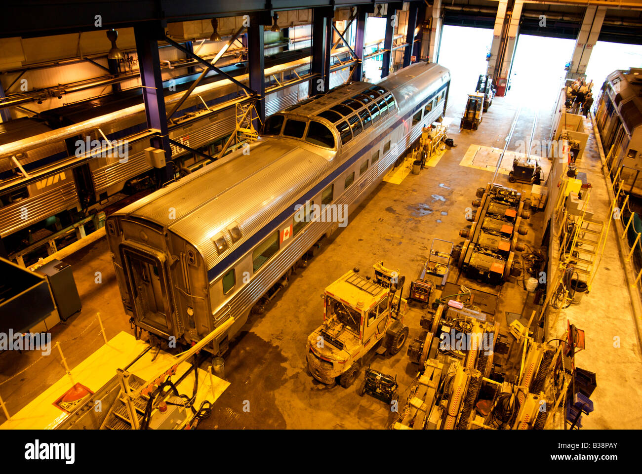 Dome observation and passenger train coach car receiving inspection and service in the VIA Rail maintenance shop Stock Photo