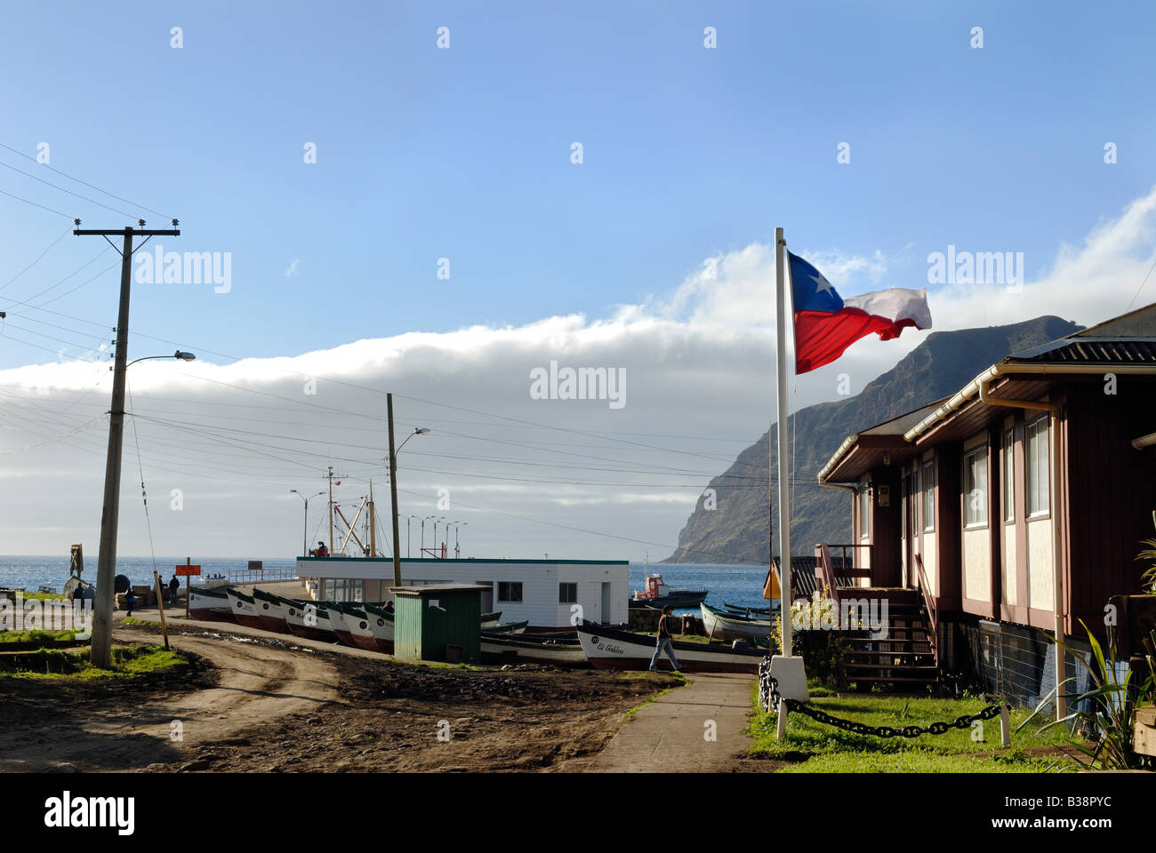 CHL Chile Juan Fernandez archipelago Robinson Crusoe Island 05 2007 Port administration with Chilean flag in San Juan Bautista Stock Photo