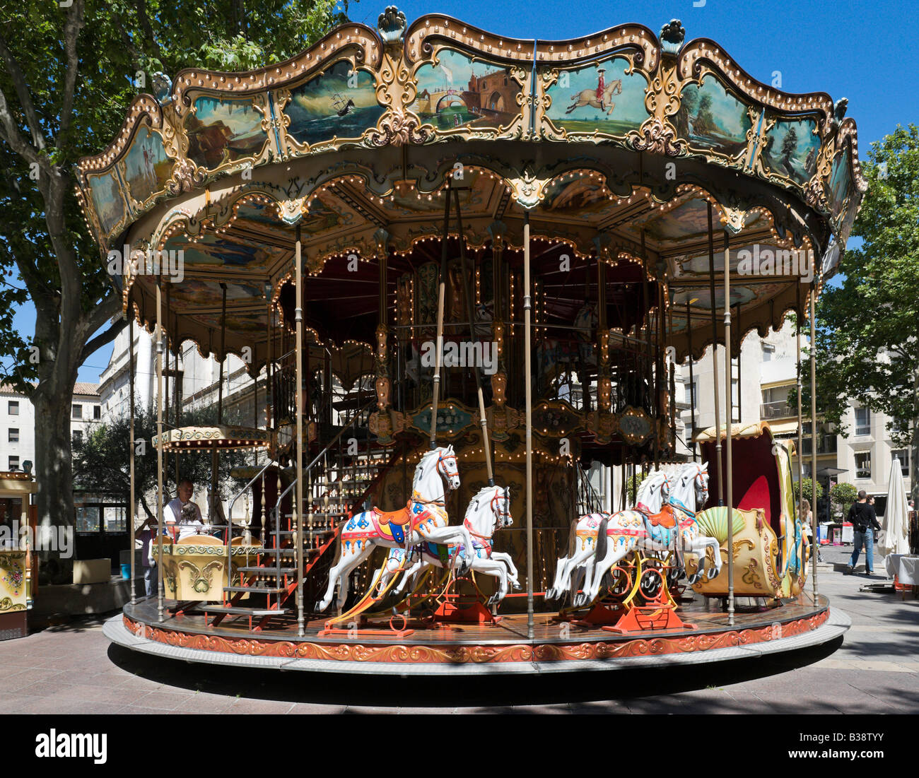 Carousel in front of the Hotel de Ville, Place d l'Horloge, Avignon, Provence, France Stock Photo