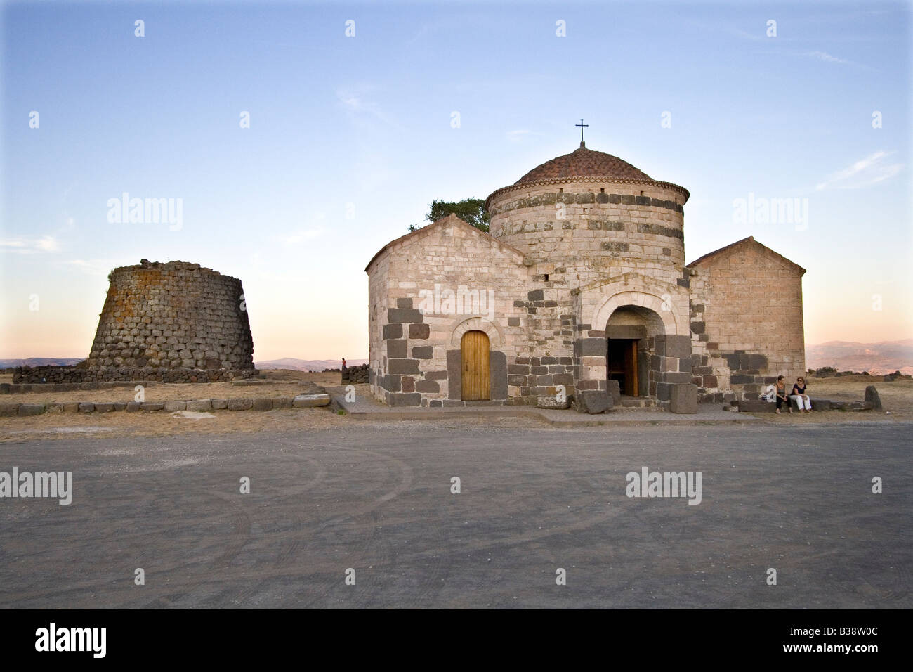 The Nuraghe and romanic church of Santa Sabina, Sardinia, Italy Stock Photo