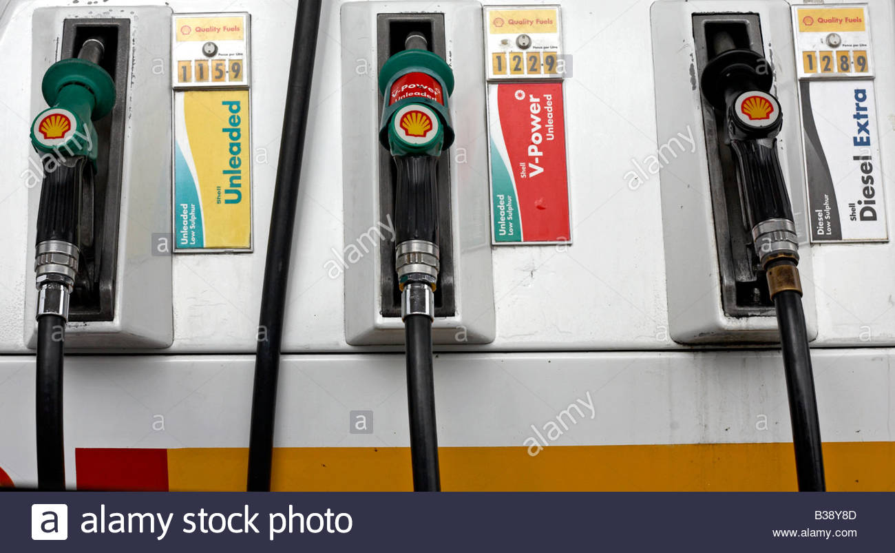 Fuel pumps on a garage forecourt Stock Photo