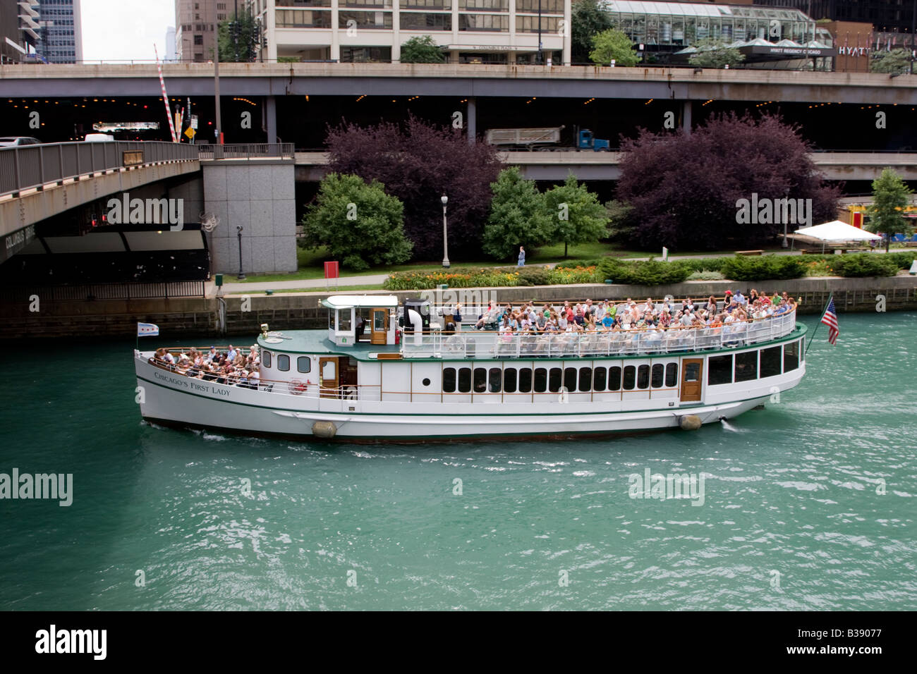 Chicago, Illinois. Tourist Boat, Chicago River. Elevated Roadways in background. Stock Photo
