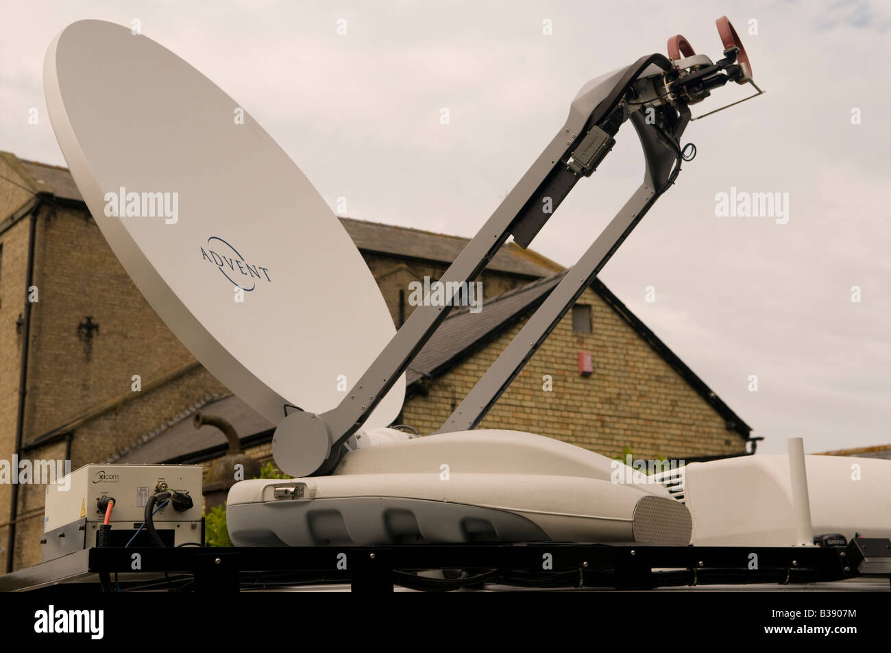 An uplink satellite dish mounted on roof of a vehicle used for fast