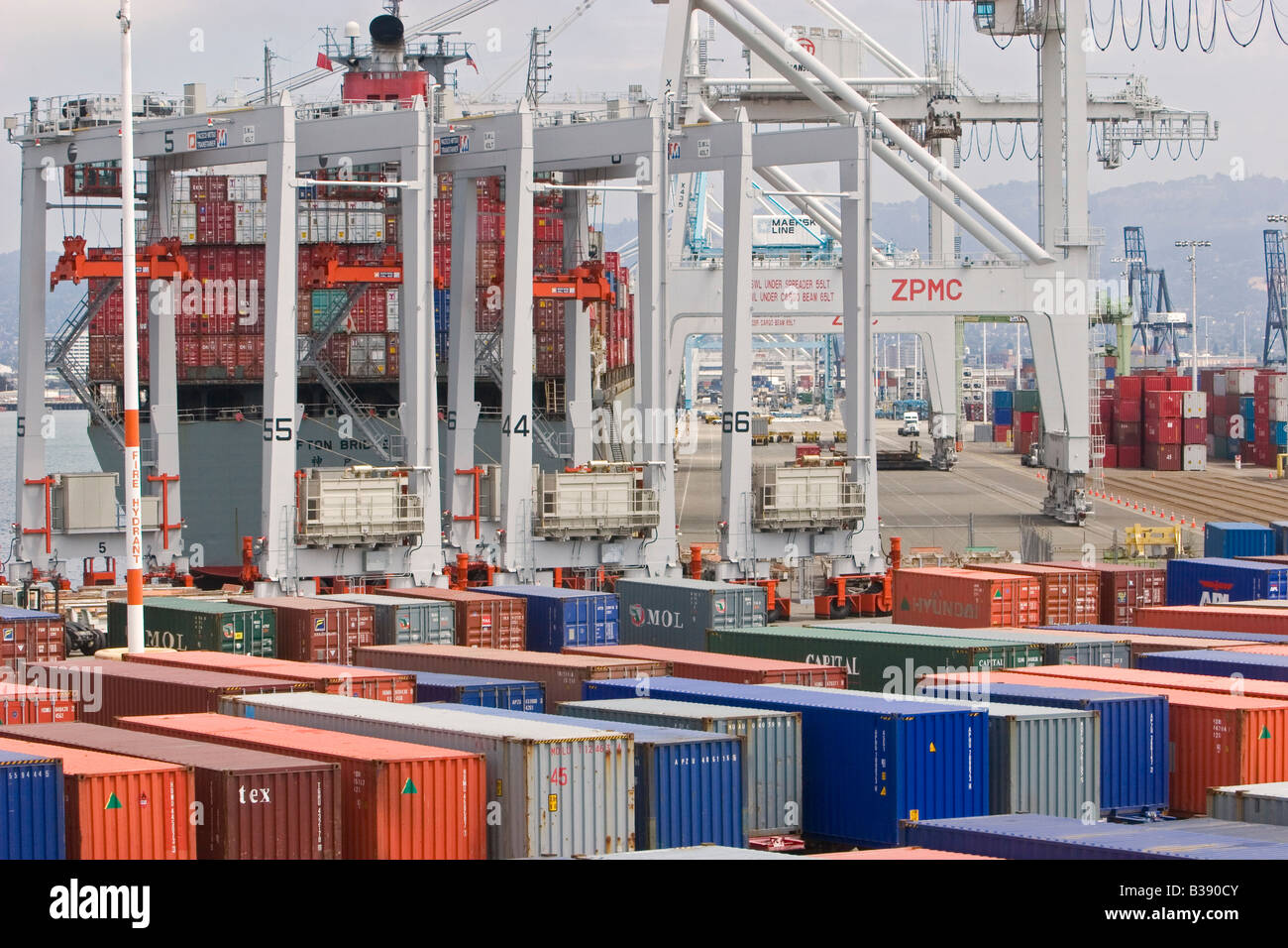 Oakland California Shipping containers are loaded onto a container ship