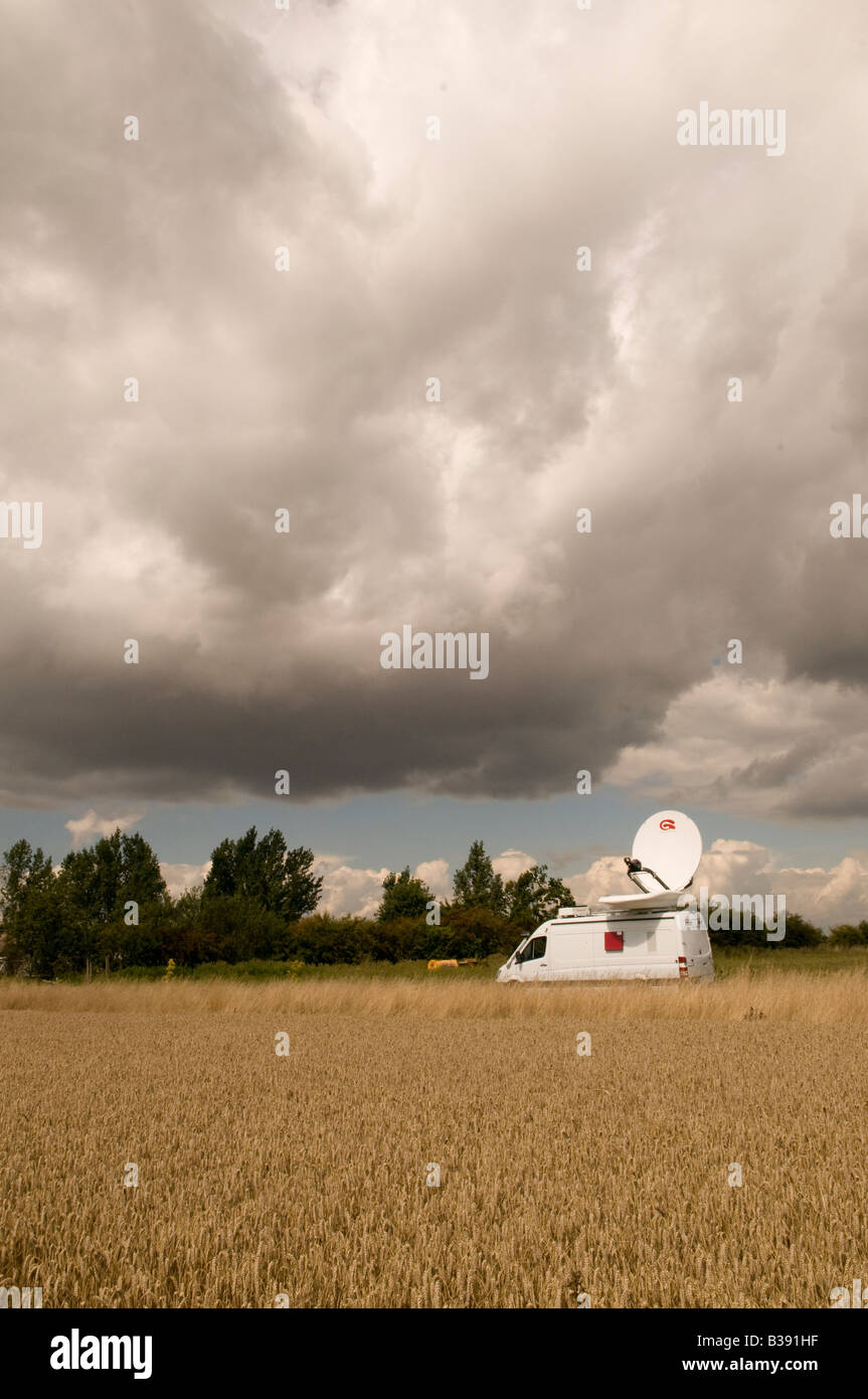 satellite up link vehicle on location in a remote location Stock Photo