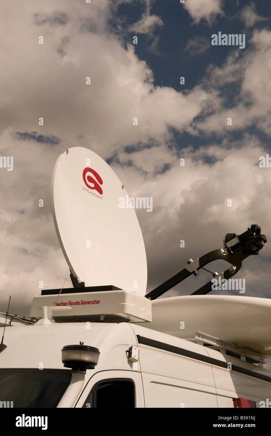 satellite uplink dish on the roof of a mercedes benz iglhaut sprinter van Stock Photo