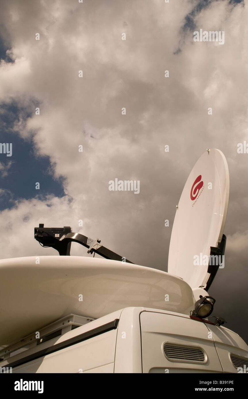 satellite uplink dish on the roof of a mercedes benz iglhaut sprinter van Stock Photo