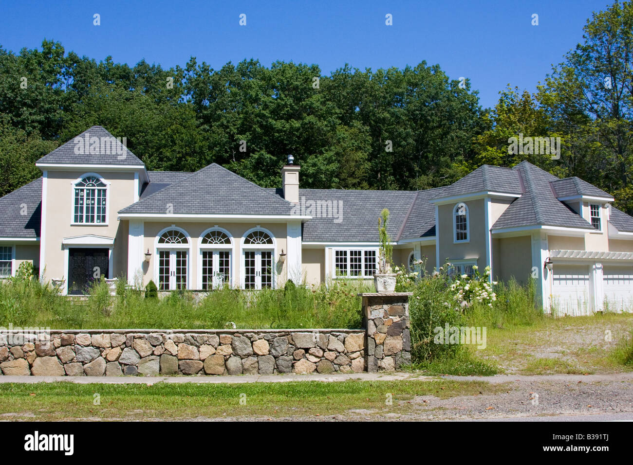 A foreclosed luxury home in a state of neglect in Rye, New Hampshire