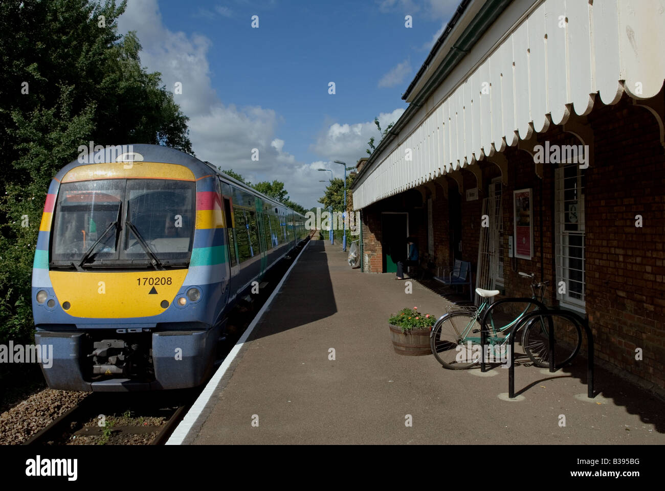 National Express passenger train running on the Ipswich to Lowestoft branch line at Melton, Suffolk, UK. Stock Photo