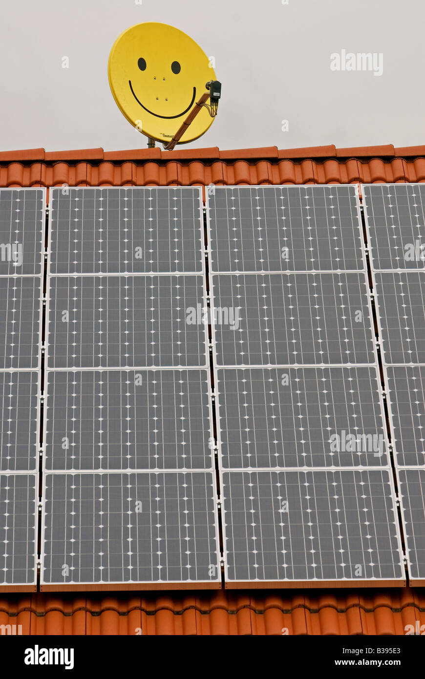 Solar energy panels fitted to the roof of a house, Marktl, Bavaria