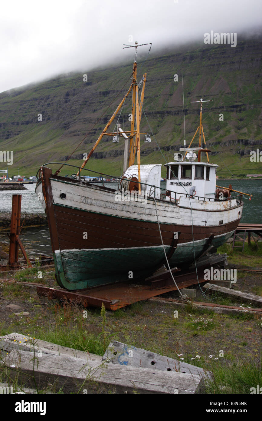 An abandoned fishing boat in Seydisfjordur, Iceland Stock Photo