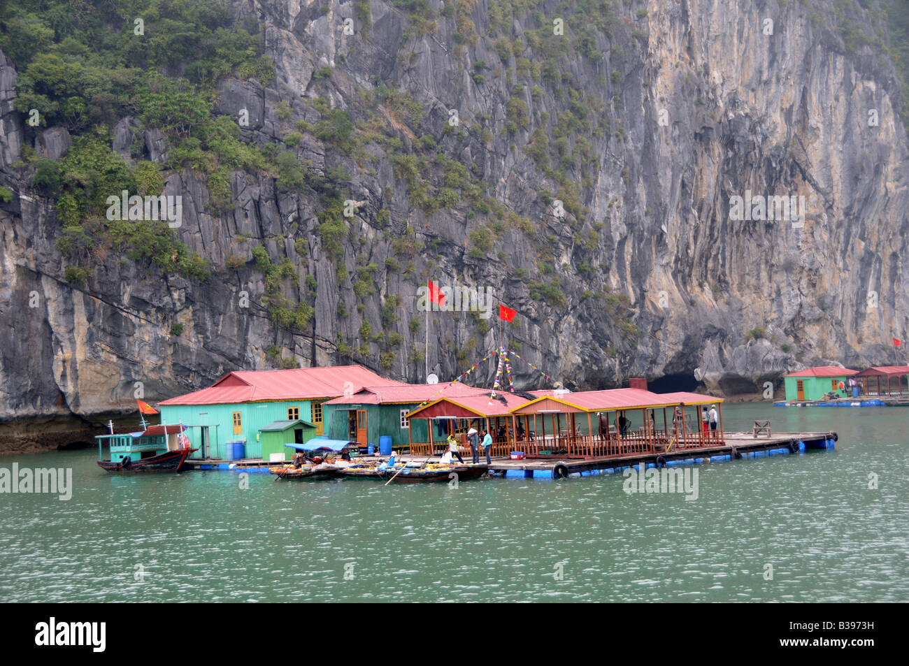 Floating Islands and house boats Halong bay Vietnam Stock Photo - Alamy