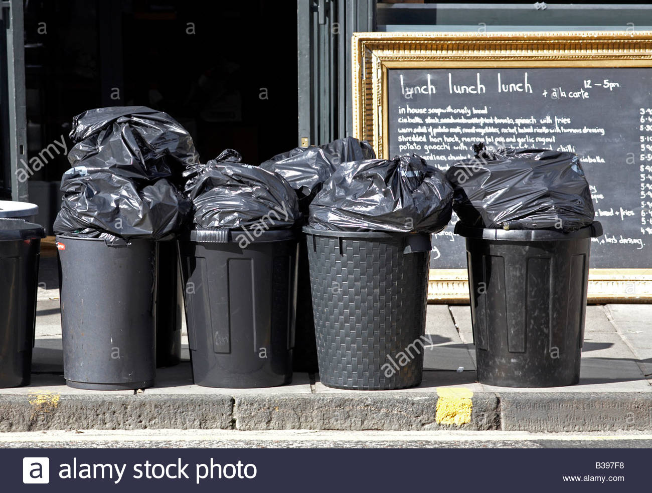 Rubbish bins on street Stock Photo Alamy