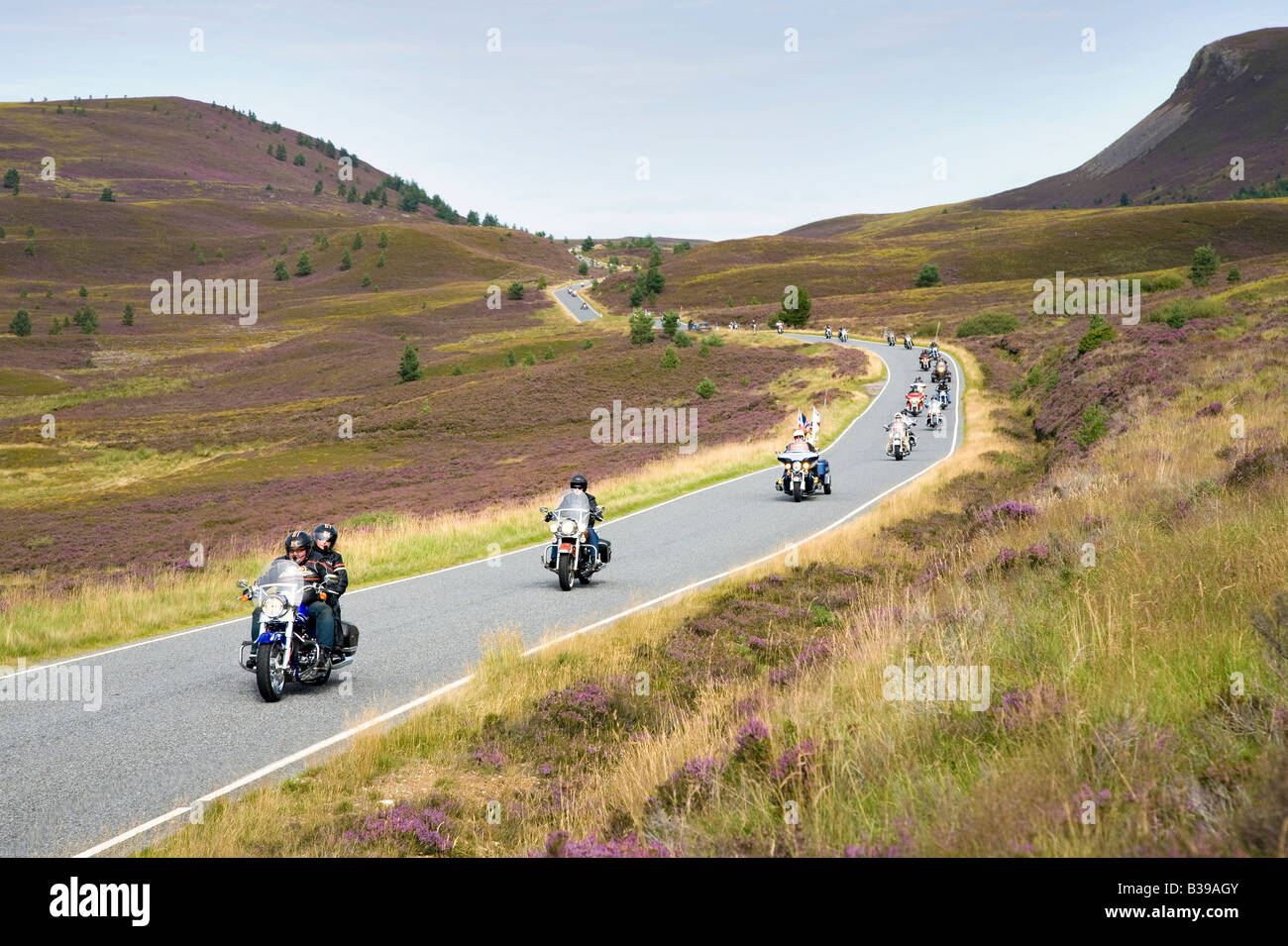 Thunder in the Glens is an annual Harley-Davidson famous mass-ride out of motorcyclists.  European bike rally ride out held in Aviemore, Scotland, UK Stock Photo