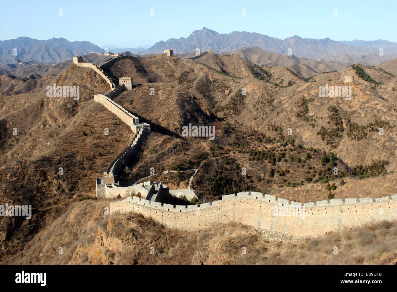 Views of the Great wall of China snaking through the land. Built ...