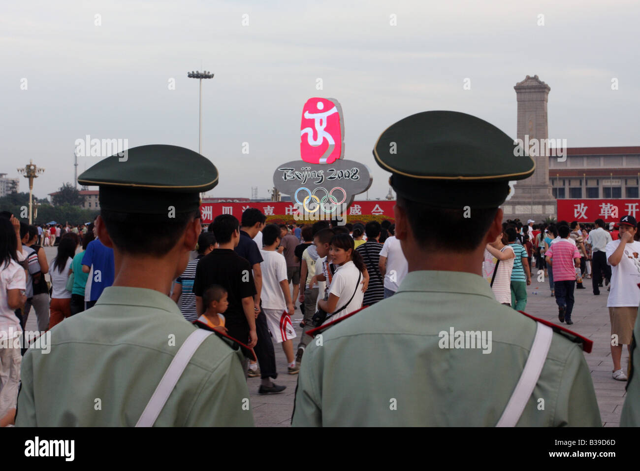soldiers by olympic sign, tiananmen square, beijing, china Stock Photo