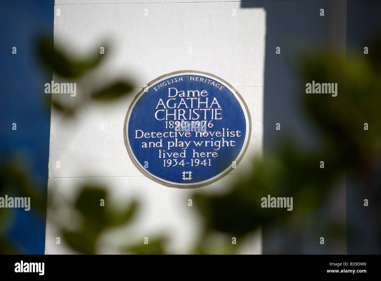 blue plaque marking a former home of novelist dame agatha christie, in sheffield terrace, kensington, london, england Stock Photo