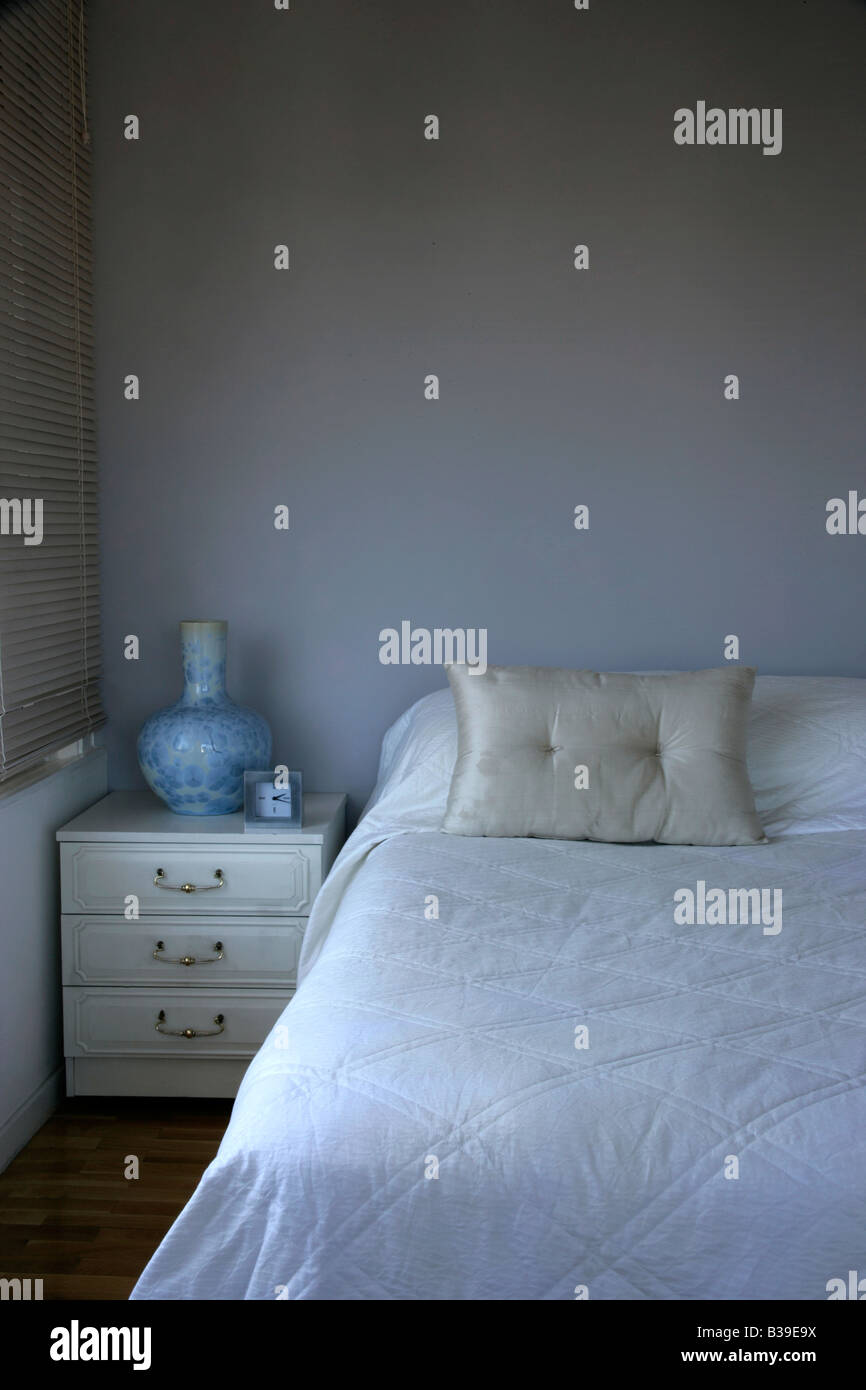 Minimalist blue and white bedroom in an apartment in fashionable Nisantasi Istanbul, Turkey Stock Photo