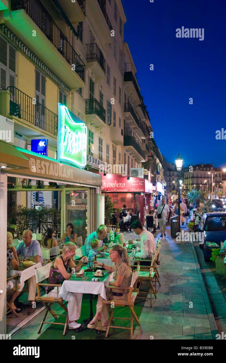 Restaurant on the Quai St Pierre by the Vieux Port in the old town (Le Suquet) at night, Cannes, Cote d'Azur, Provence, France Stock Photo