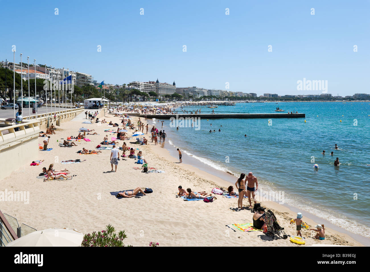 Beach outside the Palais des Festivals, Promenade de la Croisette, Cannes, Cote d'Azur, Provence, France Stock Photo