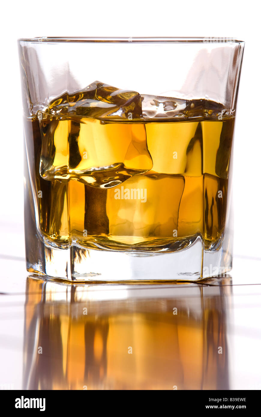A glass of whiskey on the rocks Stock Photo - Alamy