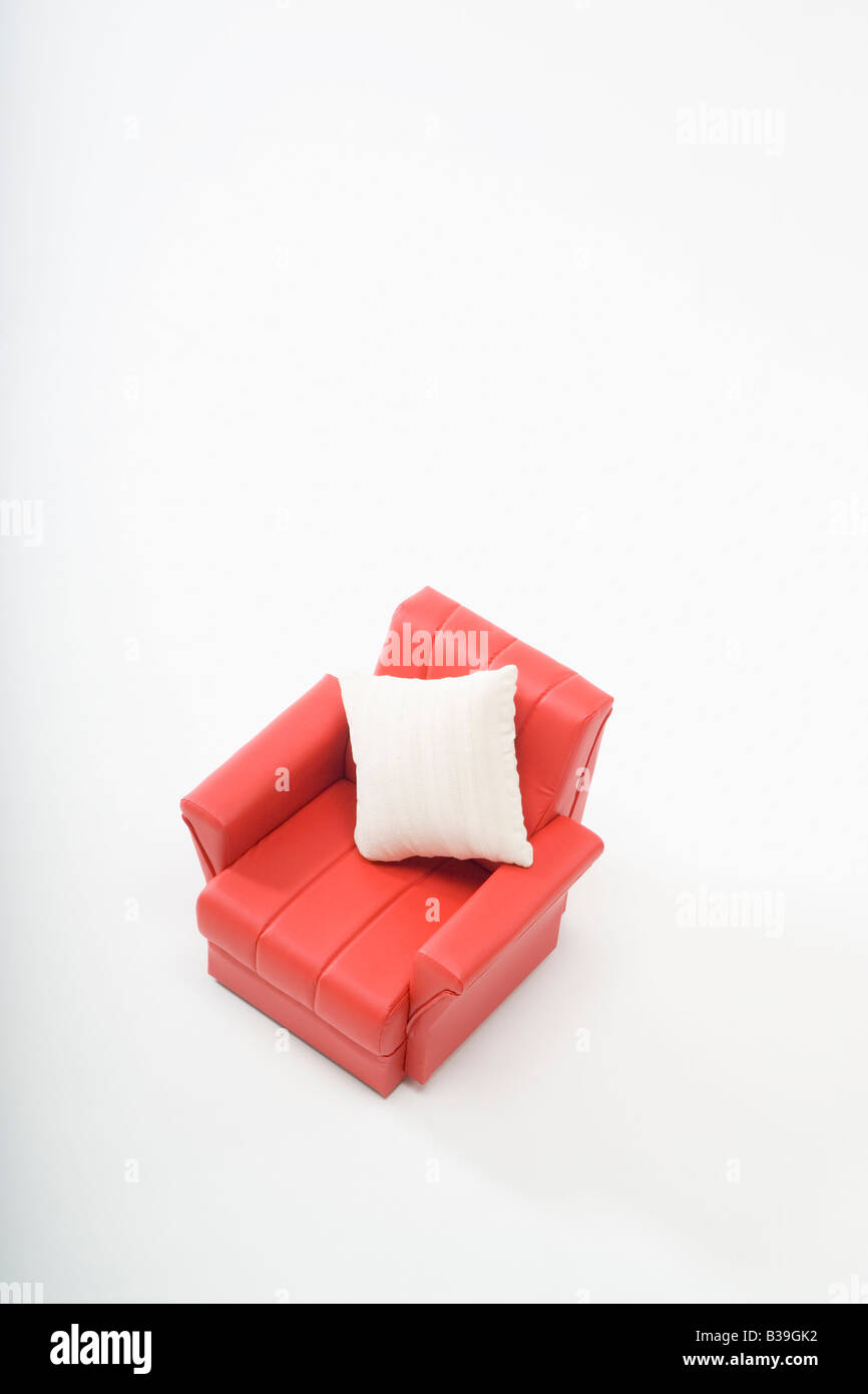 Red sofa and cushion Stock Photo Alamy