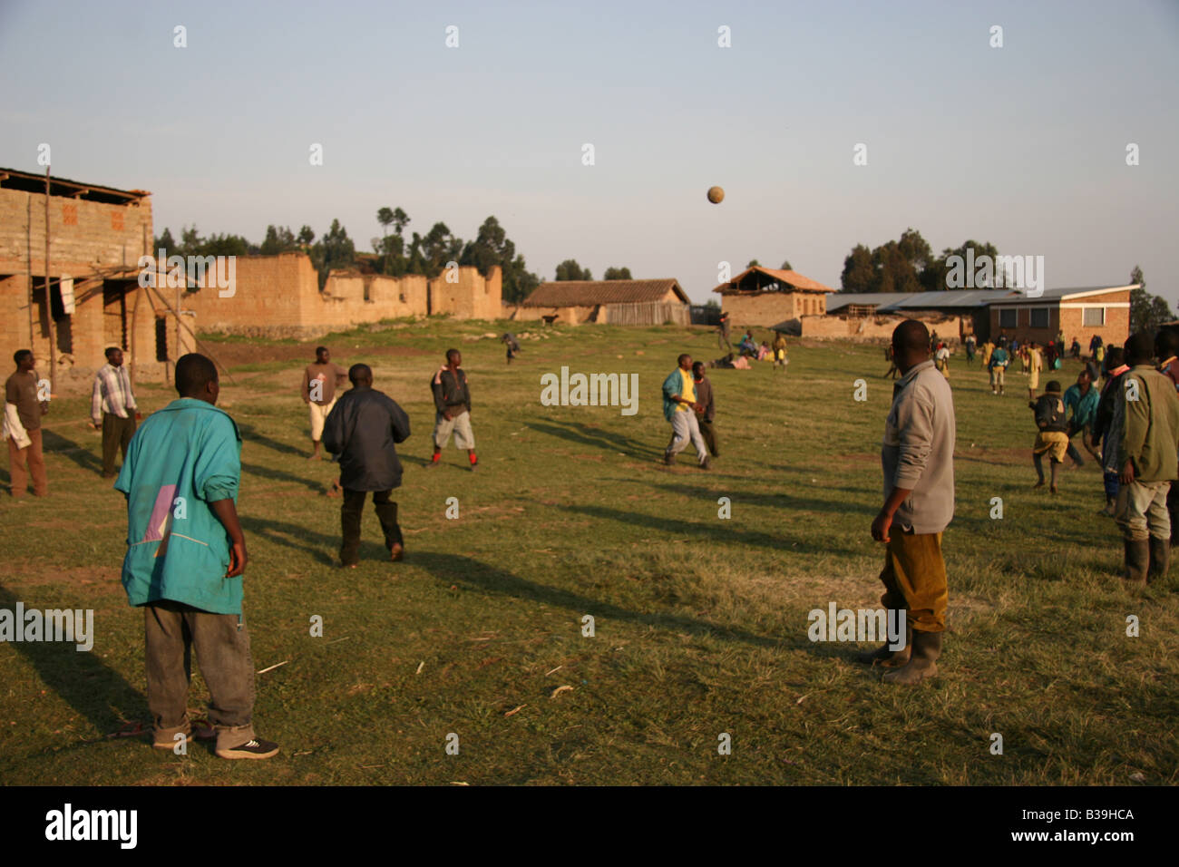 Playing footy in a small village in Africa Stock Photo - Alamy