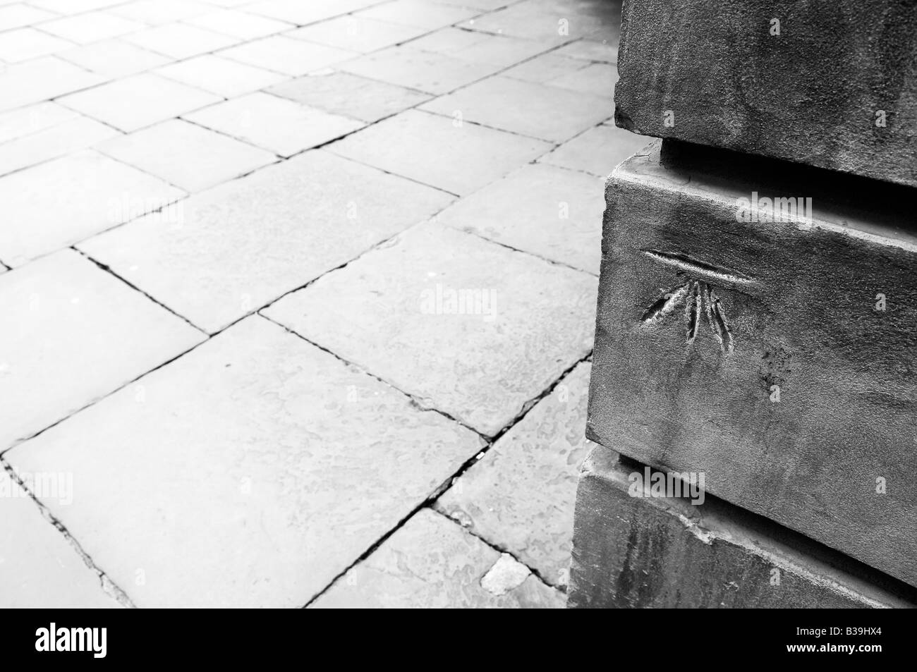 cartographers mark sign symbol saint anns church manchester england uk city centre exact paving stone flags pavement old Stock Photo