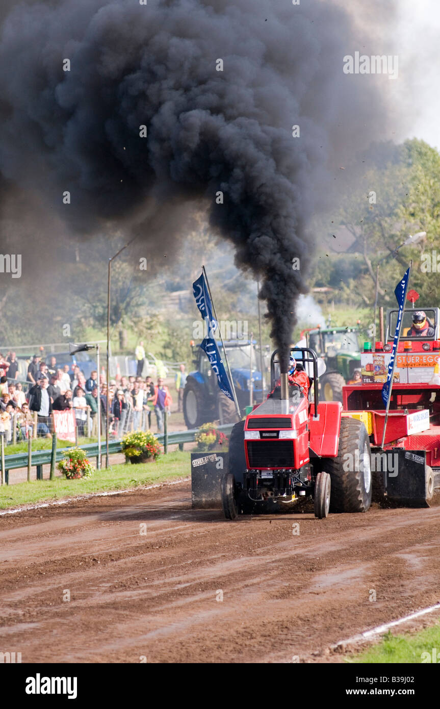 Diesel black smoke engine tractor pulling Stock Photo