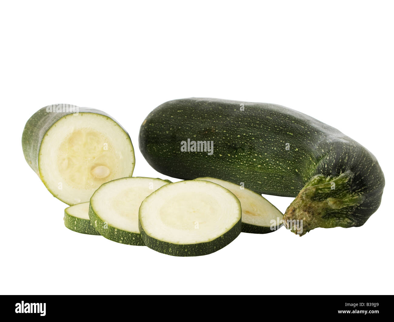 Sliced zucchini or courgette isolated on a white background Stock Photo