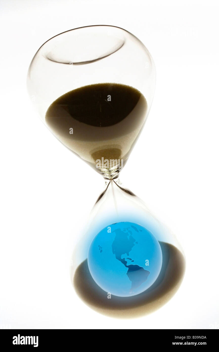 Earth and hourglass Stock Photo