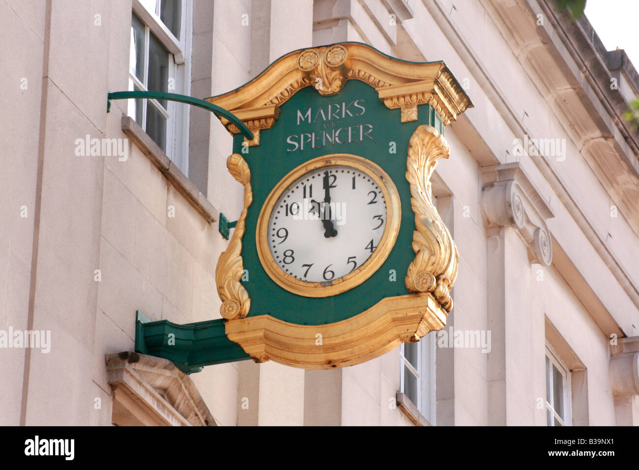 Marks & Spencer Clock - Cheltenham Store, Gloucestershire, England, UK GB Stock Photo