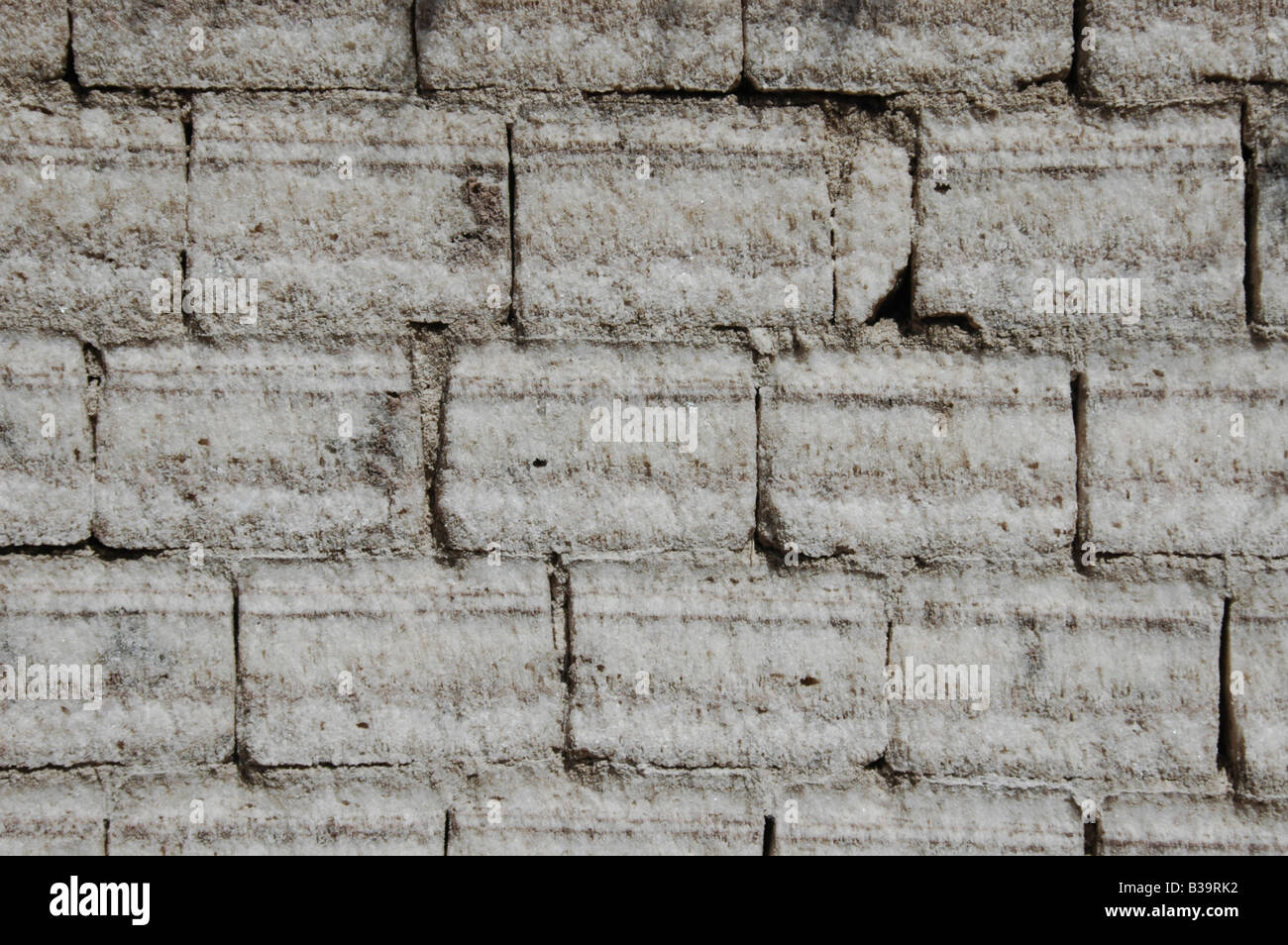 Salt bricks that are part of a wall of a salt hotel in Colchani on the edge of the Salar de Uyuni salt flat in Potosi, Bolivia. Stock Photo