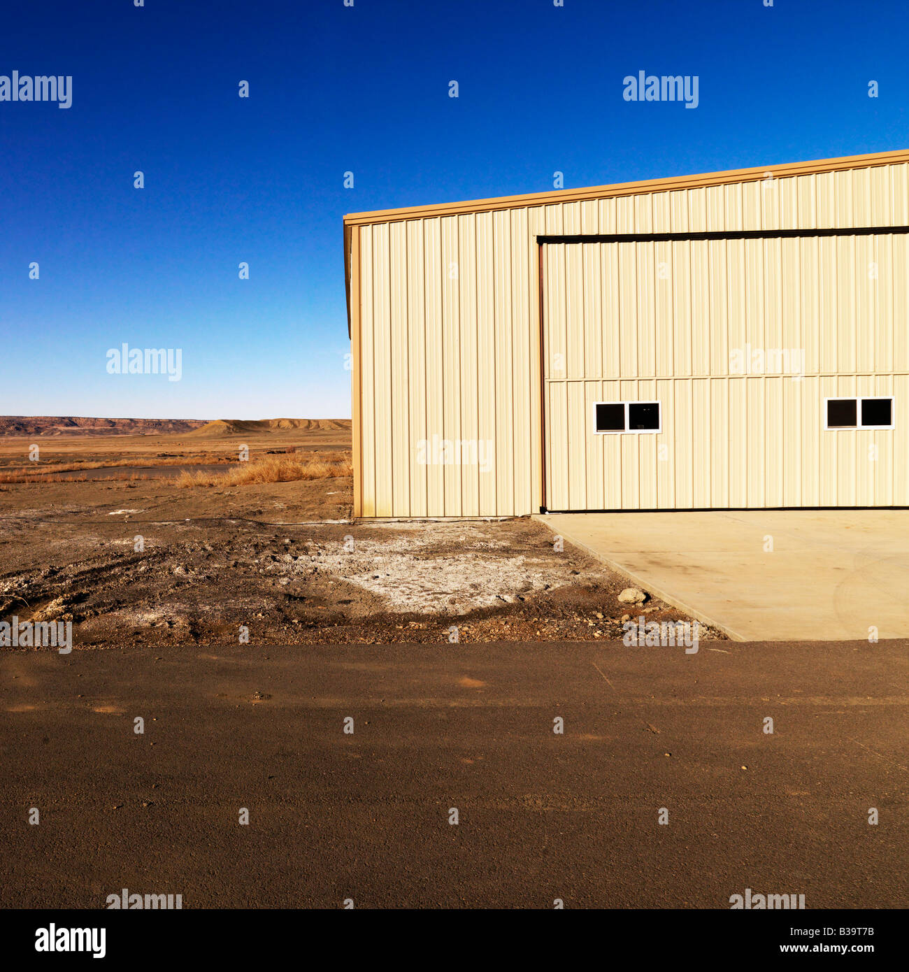 Industrial storage building in rural Utah desert Stock Photo
