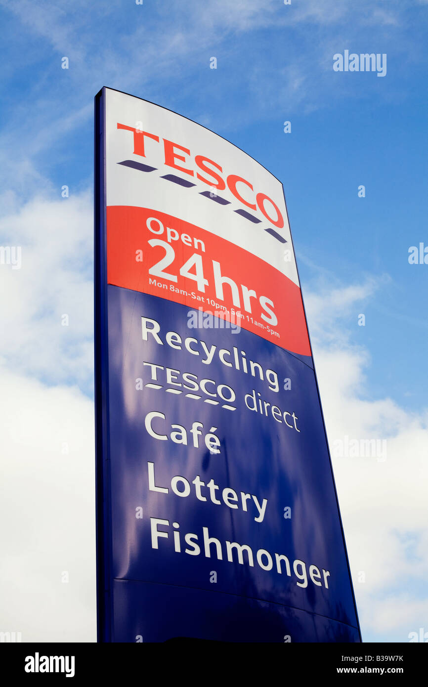 A sign for a Tesco 24 hour supermarket in the UK Stock Photo