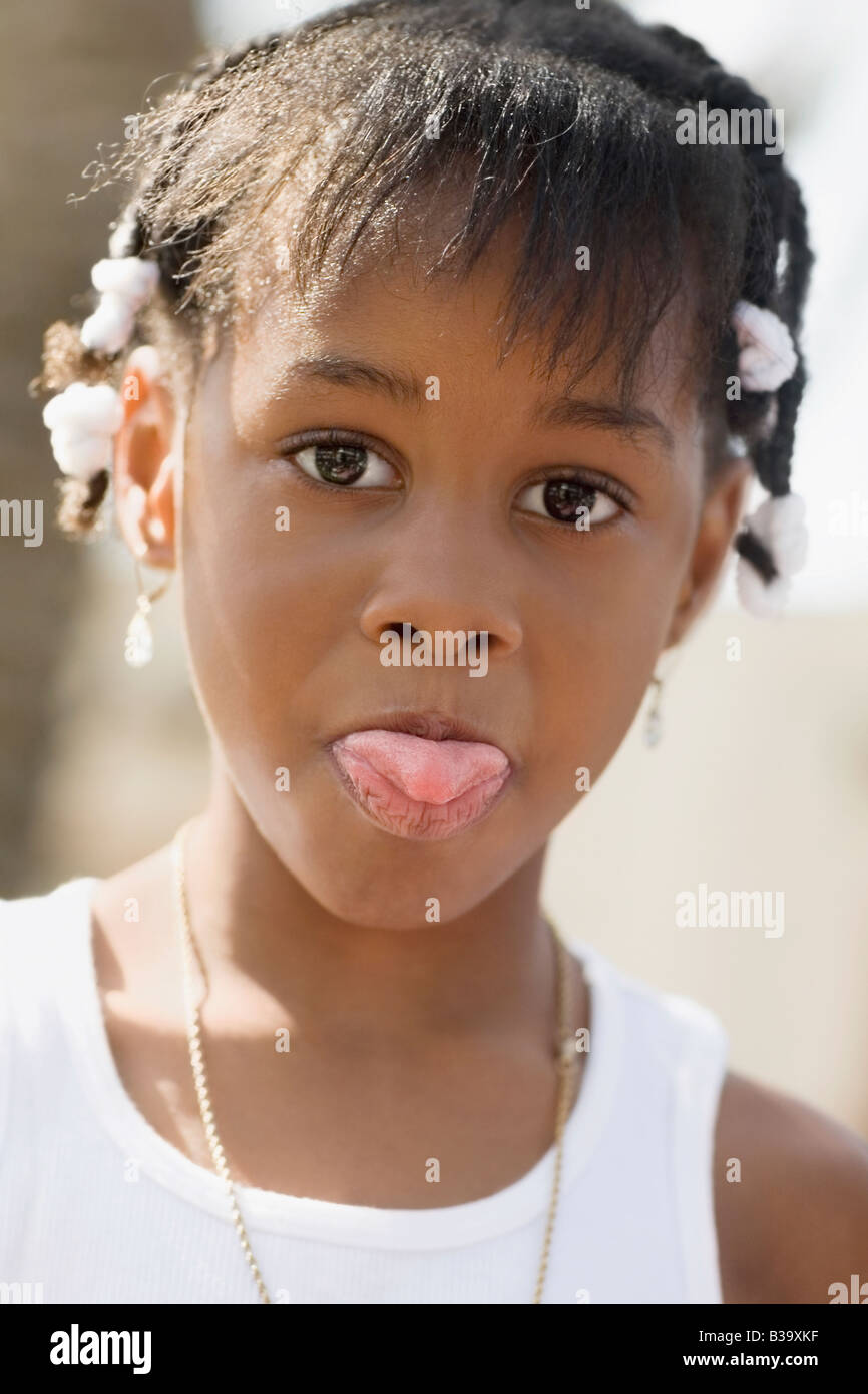 African girl sticking out tongue Stock Photo - Alamy
