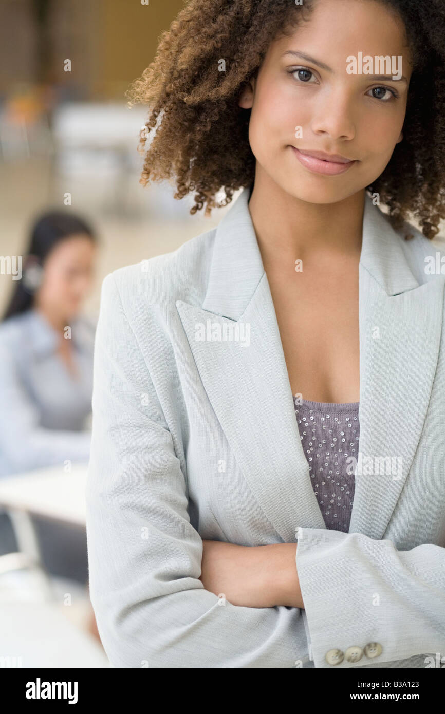 African businesswoman with arms crossed Stock Photo - Alamy