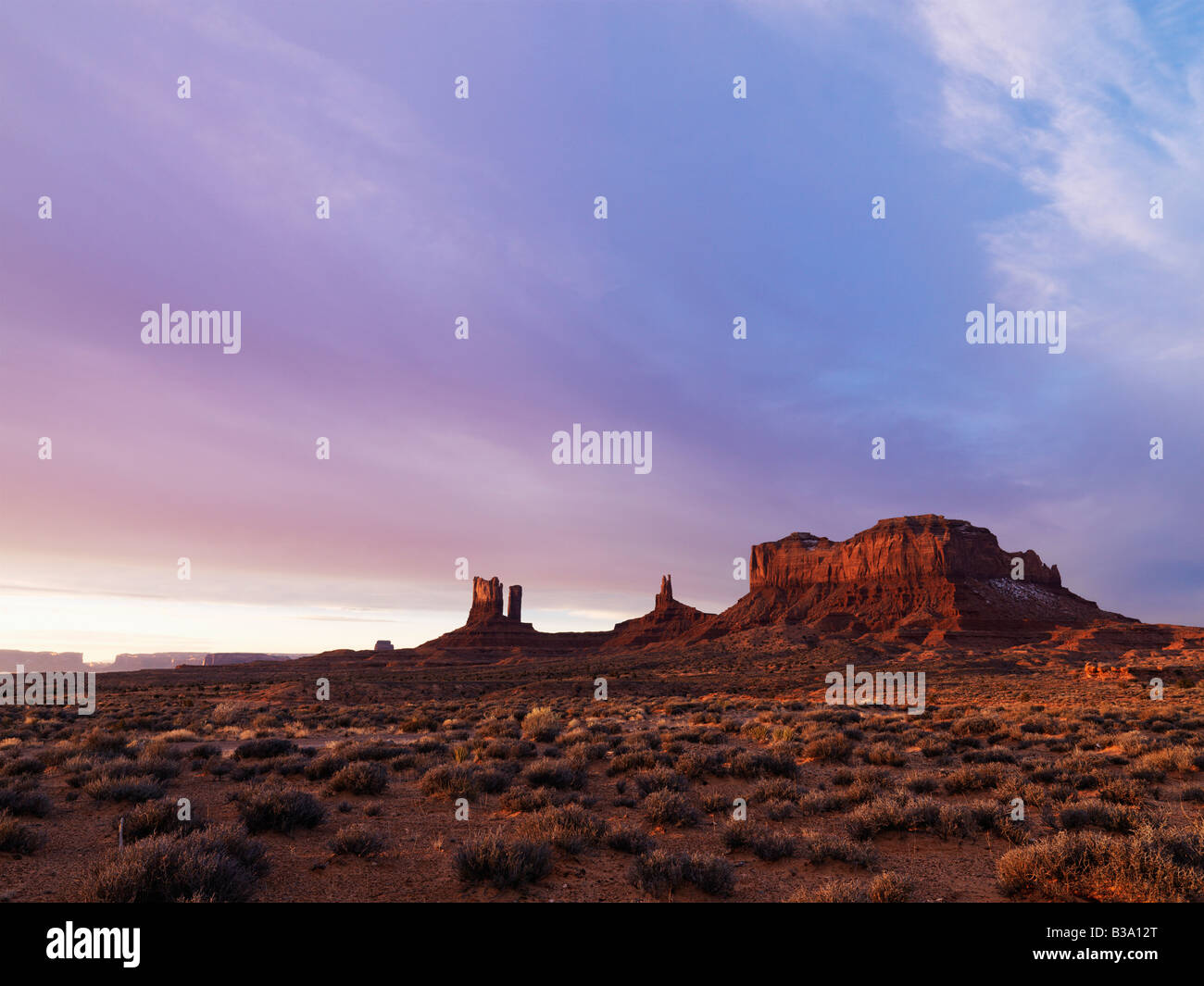 Scenic landscape at dusk of mesas in Monument Valley near the border of Arizona and Utah United States Stock Photo