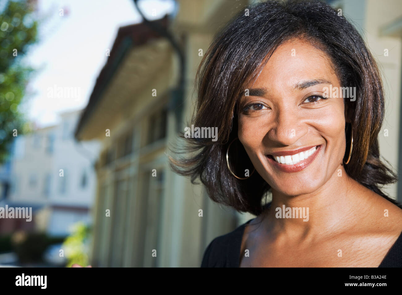 Close up of African woman smiling Stock Photo - Alamy
