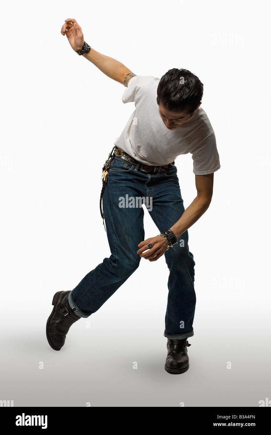 Asian man in rockabilly clothing dancing Stock Photo